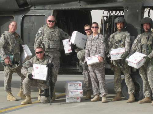 Minnesota Unit poses with received AnySoldier packages October 2009, Afghanistan.
